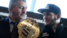 Mixed martial arts (MMA) fighter Khabib Nurmagomedov and and his father Abdulmanap Nurmagomedov give a press conference in Moscow on November 26, 2018.