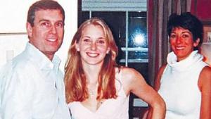 A photograph appearing to show Prince Andrew with Jeffrey Epstein&#39;s accuser Virginia Roberts Giuffre and, in the background, Ghislaine Maxwell.