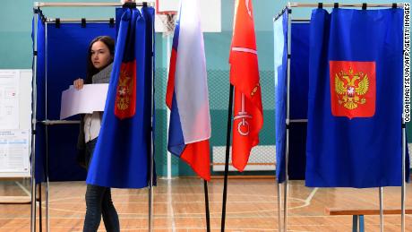 A woman votes in the governor&#39;s election in Saint Petersburg on Sunday. Russians voted in local and regional polls on September 8.