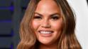 What does Chrissy Teigen do to ease pregnancy migraines? 