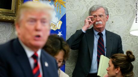 US President Donald Trump speaks as National security advisor John Bolton listens during a meeting with South Korean President Moon Jae-in, in the Oval Office of the White House on May 22, 2018 in Washington DC.  (Oliver Contreras-Pool/Getty Images)