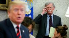 US President Donald Trump speaks as National security advisor John Bolton listens during a meeting with South Korean President Moon Jae-in, in the Oval Office of the White House on May 22, 2018 in Washington DC.  (Oliver Contreras-Pool/Getty Images)