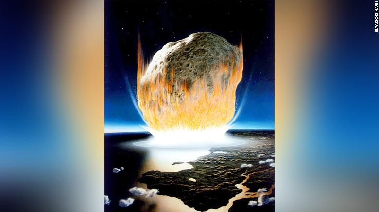 This artist's interpretation shows what the asteroid that killed most dinosaurs might've looked like. It couldn't kill many of Earth's microbacteria, though, which were largely responsible for fueling the return of life on the planet. 