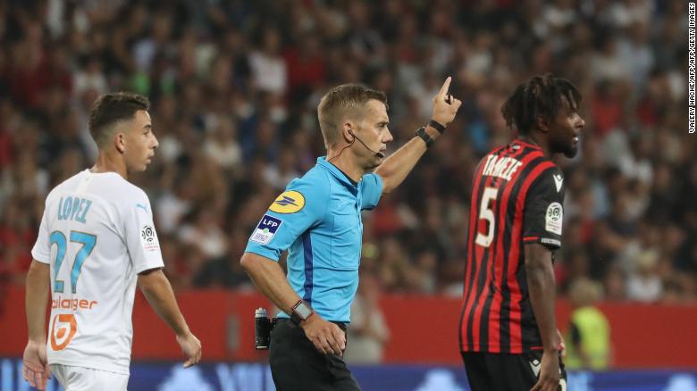 Referee Clement Turpin suspends the game between Nice and Olympique de Marseille (OM) after persistent homophobic chants and the display of a disparaging banner. 