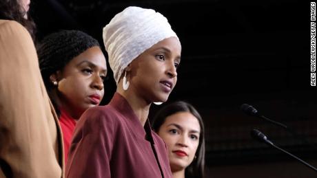 U.S. Rep. Ilhan Omar (D-MN) speaks as Rep. Rashida Tlaib (D-MI), Rep. Ayanna Pressley (D-MA), and Rep. Alexandria Ocasio-Cortez (D-NY) listen during a press conference at the U.S. Capitol on July 15