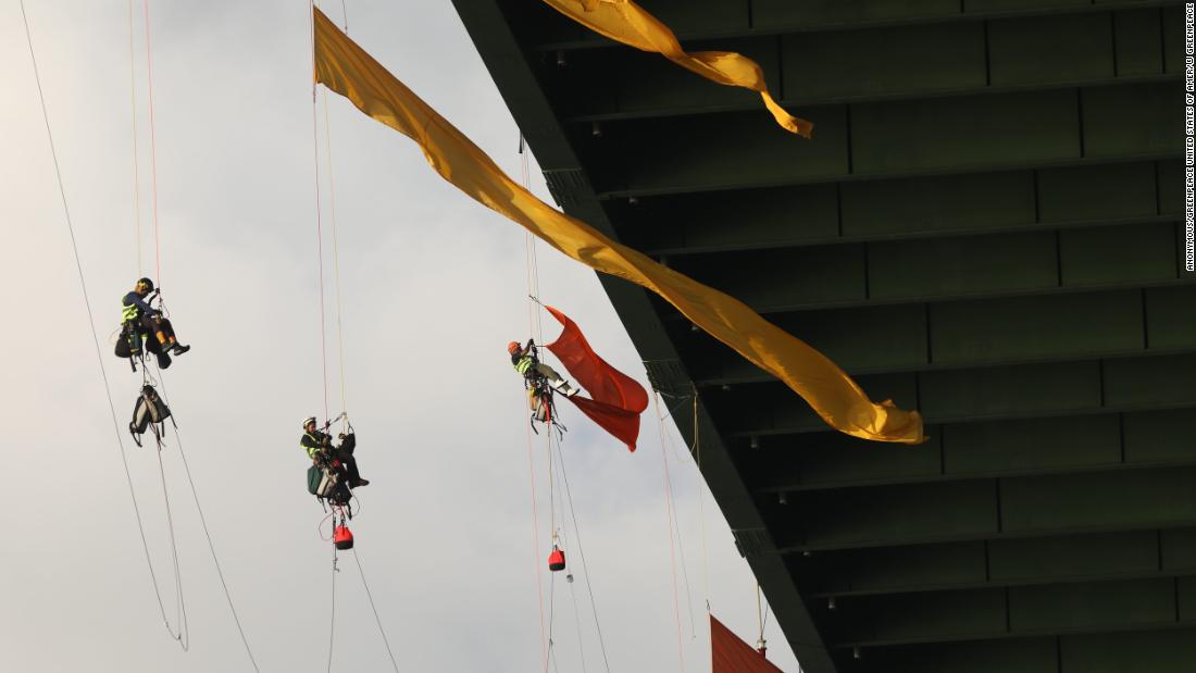 Greenpeace activists try to hang from bridge for 24 hours - CNN Video