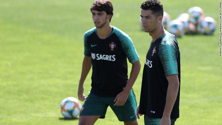 Joao Felix (L) and Portugal&#39;s forward Cristiano Ronaldo with the Portugal national team.