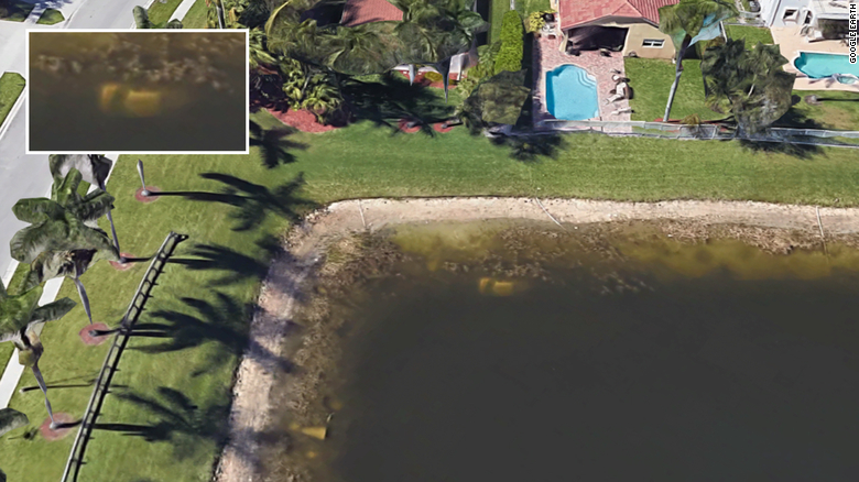 The submererged car is on the top left side of the pond. See inset.