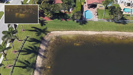 The submererged car is on the top left side of the pond. See inset.