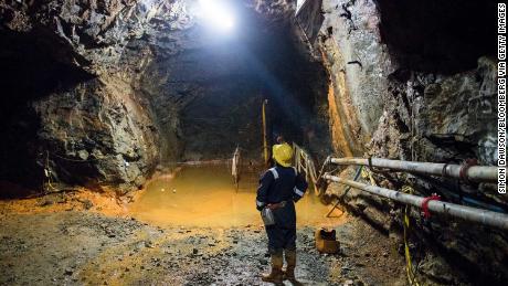 Keith Russ, a technical service engineer, stands in a tunnel at the South Crofty tin mine.