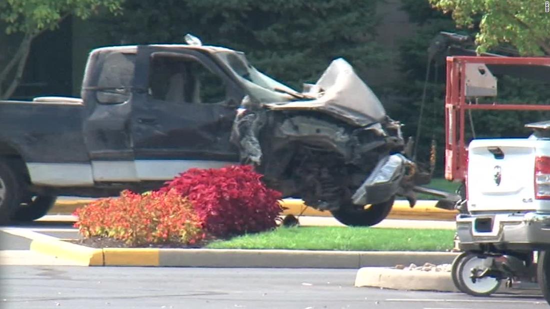 Authorities tow away the pickup truck that crashed into the emergency room at Diley Ridge Medical Center.