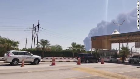 This AFPTV screen grab from a video made on September 14, 2019, shows smoke billowing from an Aramco oil facility in Abqaiq about 60km (37 miles) southwest of Dhahran in Saudi Arabia&#39;s eastern province. - Drone attacks sparked fires at two Saudi Aramco oil facilities early today, the interior ministry said, in the latest assault on the state-owned energy giant as it prepares for a much-anticipated stock listing. Yemen&#39;s Iran-aligned Huthi rebels claimed the drone attacks, according to the group&#39;s Al-Masirah television. (Photo by - / AFP)        (Photo credit should read -/AFP/Getty Images)