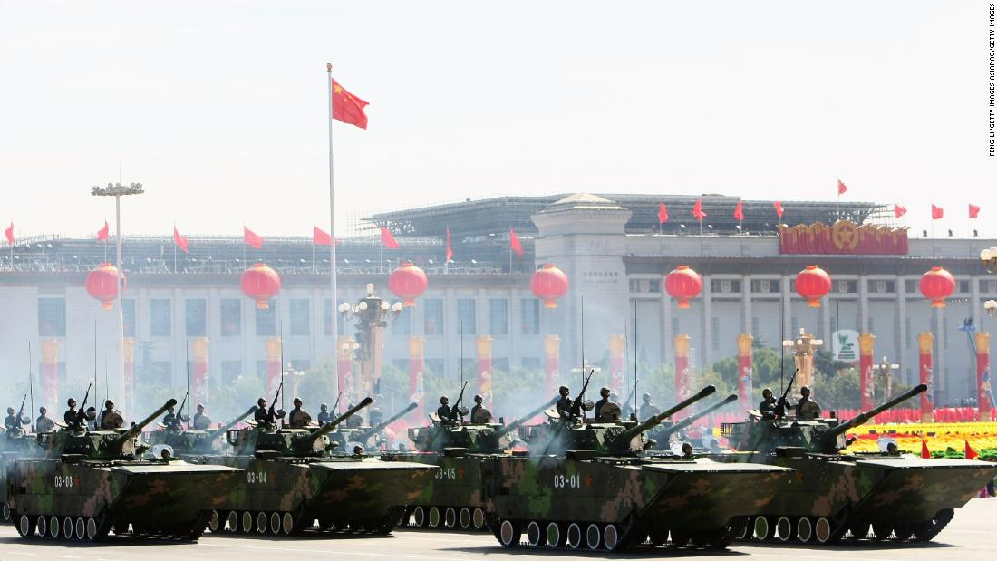 Chinese tanks rumble pass Tiananmen Square during a massive parade to celebrate the 60th anniversary of the founding of the People&#39;s Republic of China on October 1, 2009 in Beijing.