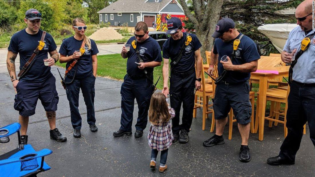 Lainie serving lemonade to the Germantown Fire Department.