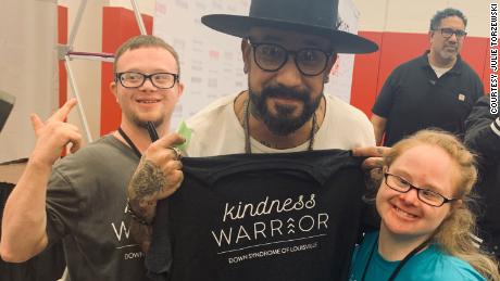 AJ McLean of the Backstreet Boys poses with members of Down Syndrome of Louisville.