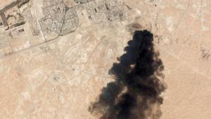 This Saturday, Sept. 14, 2019, satellite image from Planet Labs Inc. shows thick black smoke rising from Saudi Aramco's Abqaiq oil processing facility in Buqyaq, Saudi Arabia. Yemen's Houthi rebels launched drone attacks on the world's largest oil processing facility in Saudi Arabia and a major oil field Saturday, sparking huge fires and halting about half of the supplies from the world's largest exporter of oil. (Planet Labs Inc via AP)