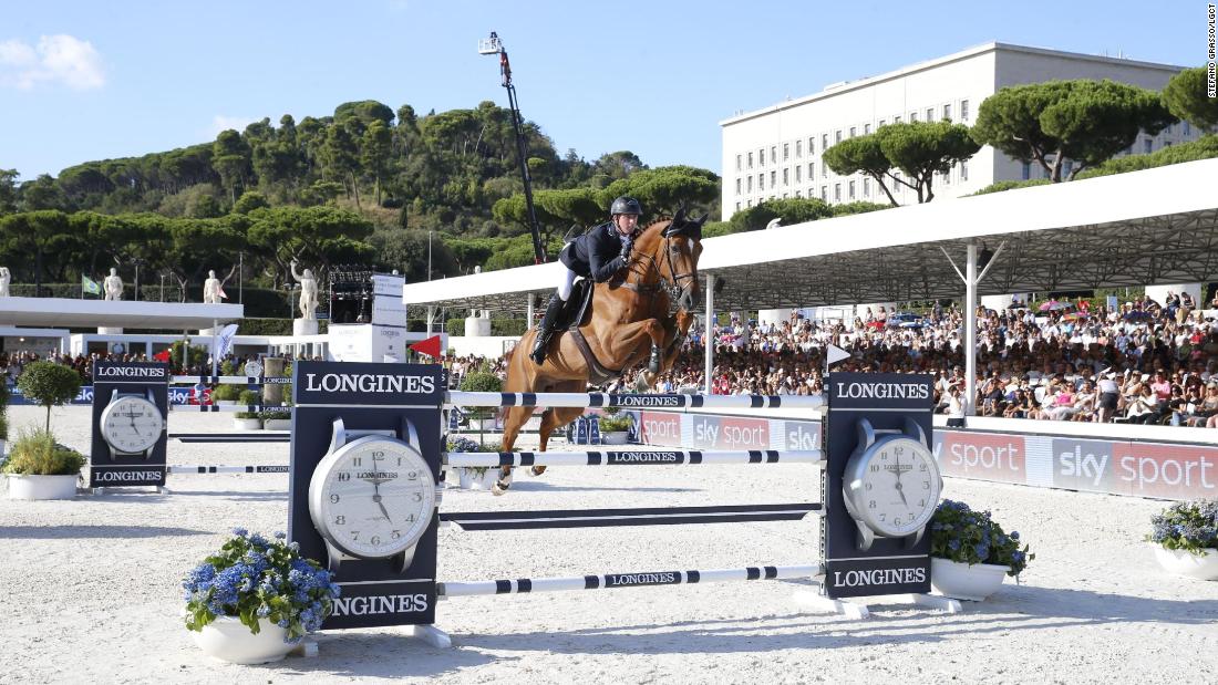 Britain&#39;s Ben Maher, the defending overall champion, clinched the Rome Grand Prix to climb to the top of the season standings. 