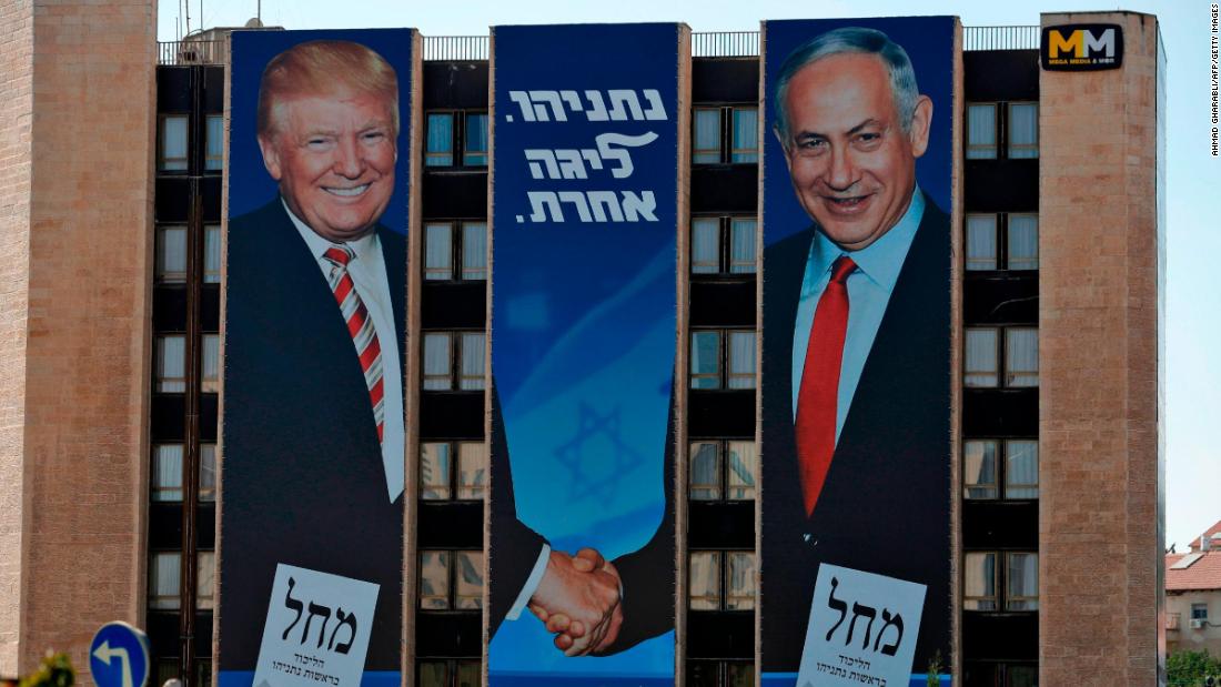 An election banner on a Jerusalem building, photographed in September 2019, shows Netanyahu shaking hands with US President Donald Trump. Trump was incredibly popular in Israel — far more popular than he was in the United States.