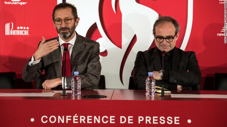 Marc Ingla (L) and Luis Campos (R) take part in a press conference for Lille.