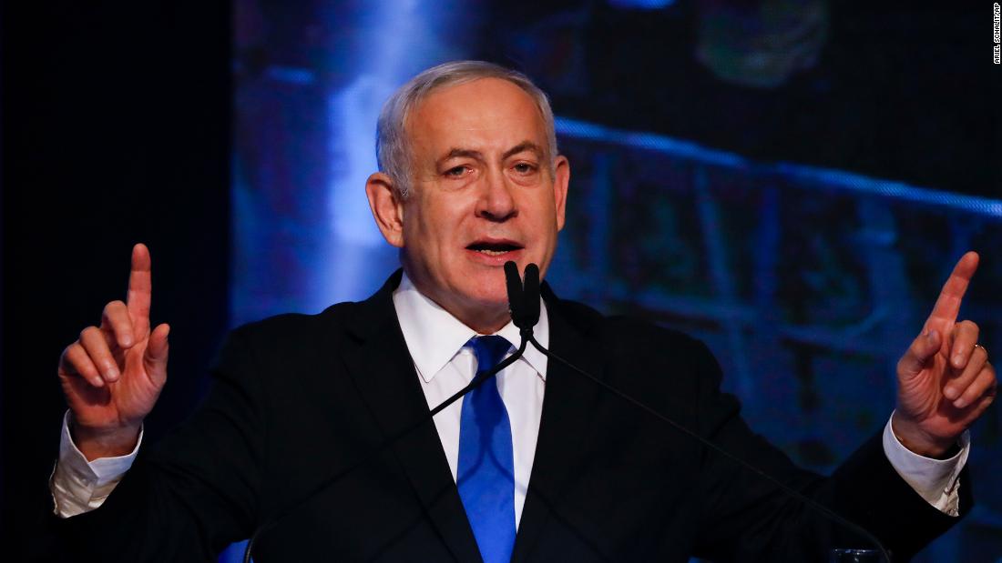 Israeli Prime Minister Benjamin Netanyahu addressees his supporters at party headquarters after elections in Tel Aviv, Israel, Wednesday, Sept. 18, 2019.