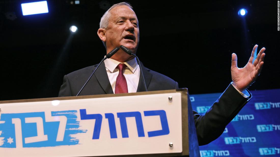 Benny Gantz, leader and candidate of the Israel Resilience party that is part of the Blue and White (Kahol Lavan) political alliance, addresses supporters at the alliance's campaign headquarters in the Israeli coastal city of Tel Aviv early on September 18, 2019.