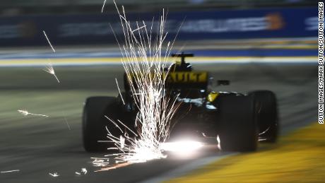 Nico Hulkenberg of Renault triggers sparks at a practice session at the Marina Bay Circuit, Singapore, 2018.