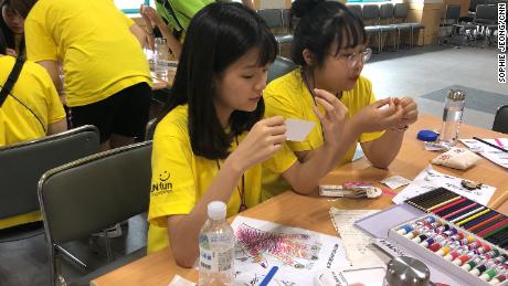 Campers decorate their nails at a government-sponsored smartphone addiction camp in Cheonan, South Korea in July, 2019.