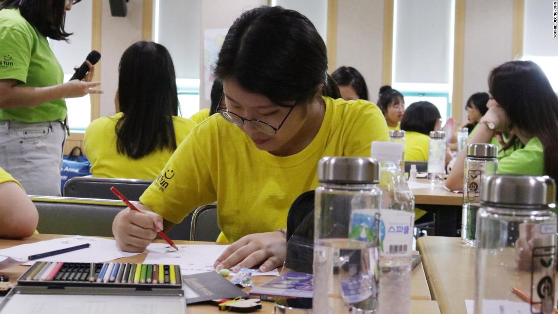 Yoo Chae-rin, 16, join in smartphone-free activities at a government smartphone addiction camp in Cheonan, South Korea.