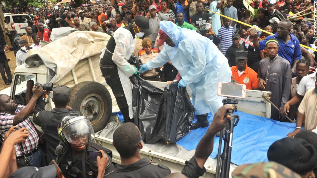 Rescuers at the scene of the fire on Wednesday.