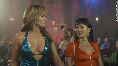 Jennifer Lopez and Constance Wu in Hustlers.