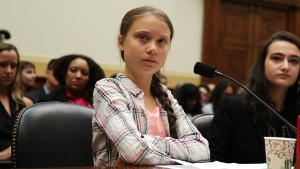 WASHINGTON, DC - SEPTEMBER 18:  Founder of Fridays For Future Greta Thunberg (L) and co-founder of This Is Zero Hour and plaintiff in Piper v. State of Washington Jamie Margolin (R) testify during a House Foreign Affairs Committee Europe, Eurasia, Energy and the Environment Subcommittee and House (Select) Climate Crisis Committee joint hearing September 18, 2019 on Capitol Hill in Washington, DC. Thunberg, who recently sailed across the Atlantic Ocean in a zero-carbon emissions sailboat, is in Washington to discuss the climate crisis with lawmakers and will speak at the UN Climate Action Summit on September 23 in New York.  (Photo by Alex Wong/Getty Images)