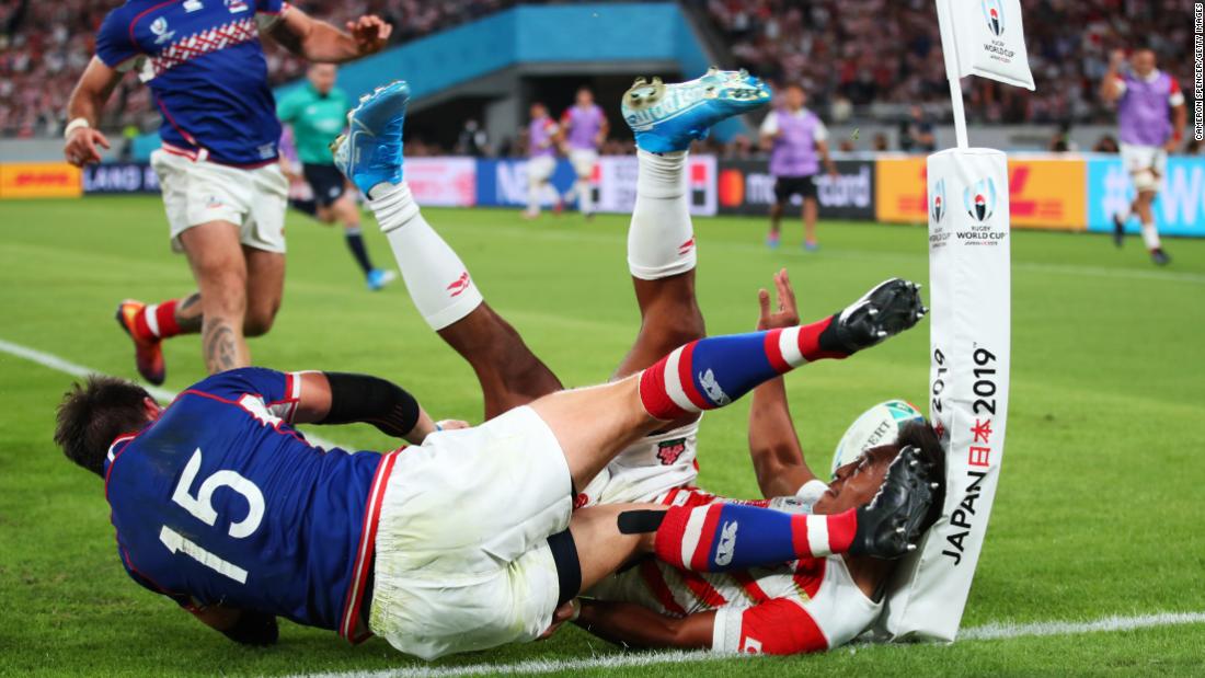 Russia scored first and led 7-0, before Japan gradually grew into the match. Kotaro Matsushima of Japan touches down for a try under pressure from Vasily Artemyev of Russia, but it is disallowed.