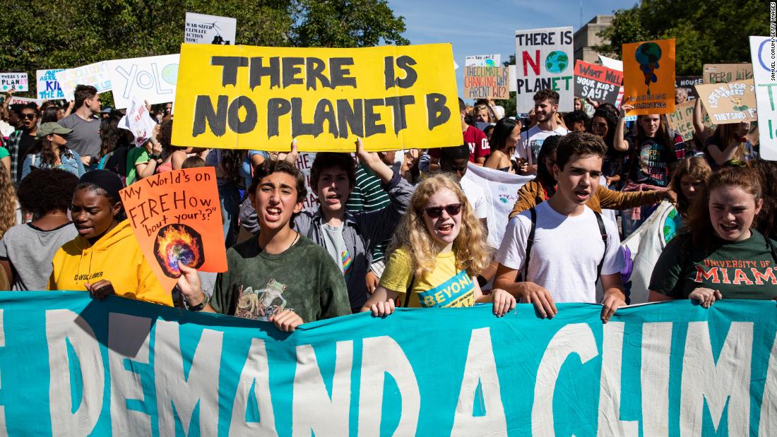 Protesters gather in John Marshall Park in Washington on Friday, September 20, as they take part in a global climate strike