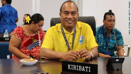 Kiribati President Taneti Mamau (C) smiles as he attends the &quot;Small Islands States&quot; meeting at the Civic Center in Aiwo on the Pacific island of Nauru on September 3, 2018.