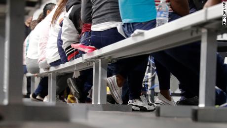 Migrants who are applying for asylum in the United States go through a processing area at a new tent courtroom at the Migration Protection Protocols Immigration Hearing Facility, Tuesday, September 17, 2019, in Laredo, Texas.