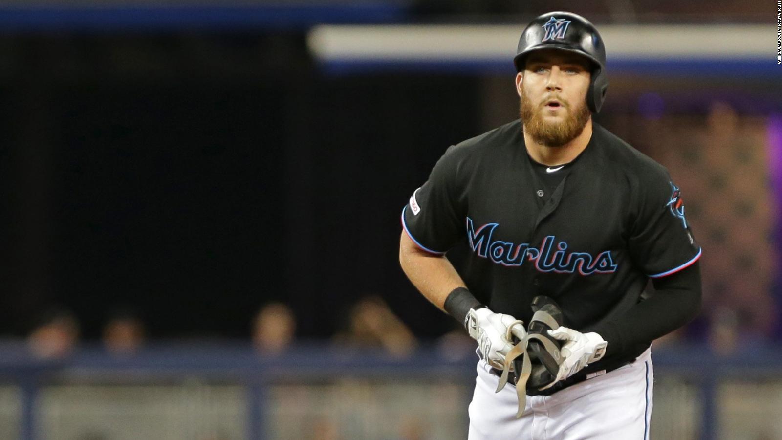 Austin Dean of the Miami Marlins stuns the crowd with a perfect throw ...