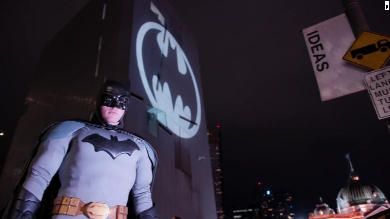 Cities across the world flash the Bat Signal on Batman Day
