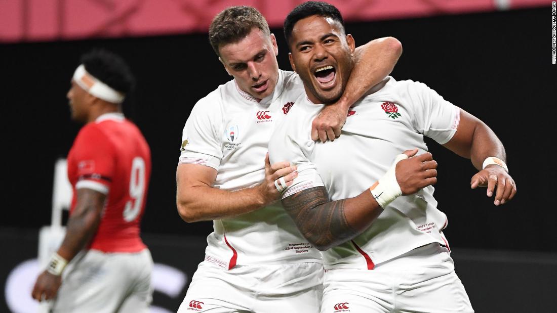 England&#39;s centre Manu Tuilagi celebrates with fly-half George Ford after scoring a try.
