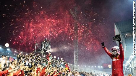 Sebastian Vettel celebrates winning the race. 