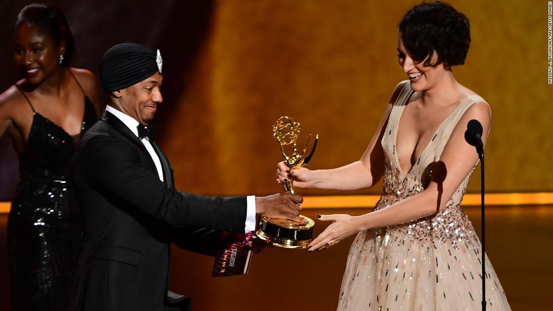 Phoebe Waller-Bridge accepting one of multiple Emmy Awards she won on Sunday. (Photo by Frederic J. BROWN / AFP) 