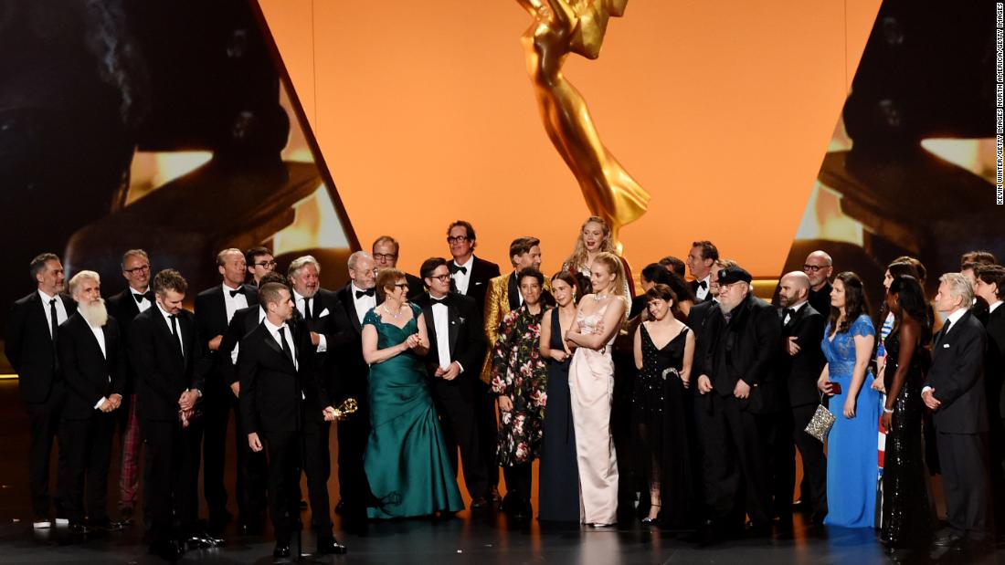 'Game of Thrones' team accepts the outstanding drama series Emmy. (Photo by Kevin Winter/Getty Images)