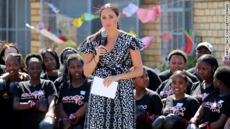 Meghan, Duchess of Sussex makes a speech as she visits a Justice Desk initiative in Nyanga township, with Prince Harry.