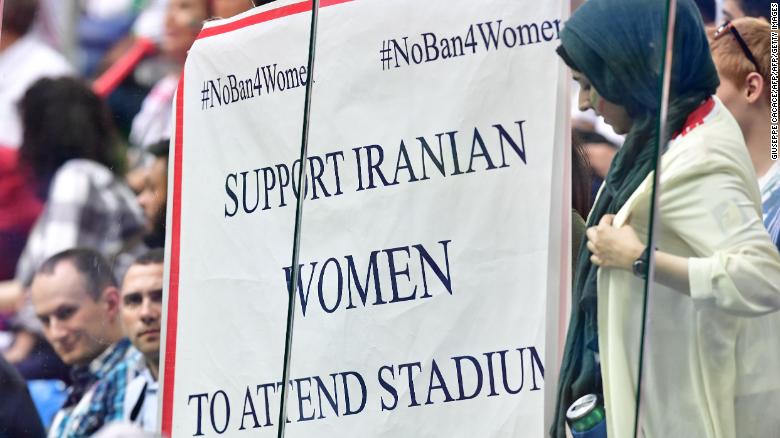 A banner reading &quot;Support Iranian women to attends stadiums&quot; is displayed during the Russia 2018 World Cup Group B football match between Morocco and Iran.