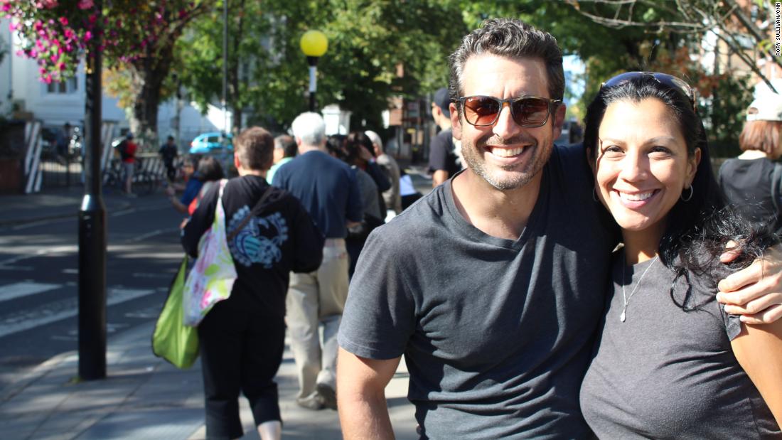 Mark and Vanessa Kramer from Orlando, Florida, enjoy Abbey Road on a sunny afternoon. 