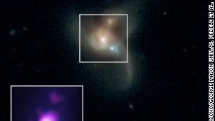 These three black holes are going to crash into each other