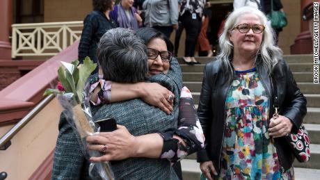 MP&#39;s Jenny Leong and Mehreen Faruqi embrace outside Parliament after the passing of the bill to decriminalize abortion on September 26, 2019 in Sydney, Australia.