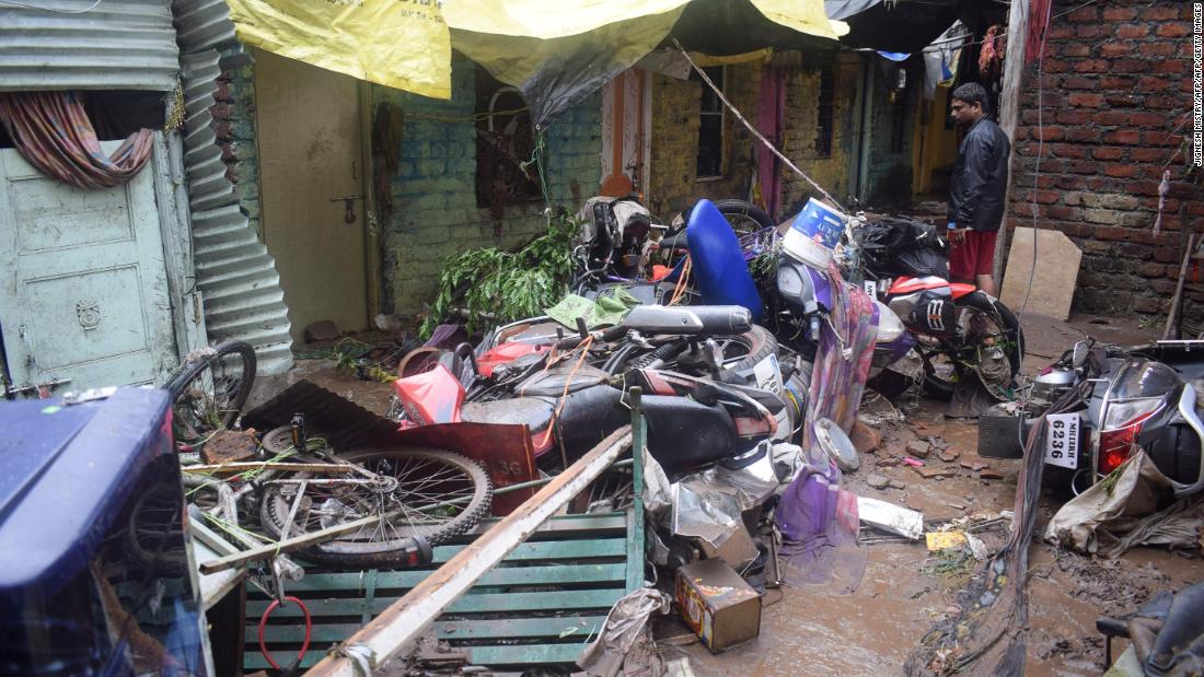 A man looks at his damaged home after flash floods in Pune, India, on September 26, 2019.