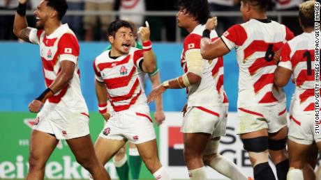Japan players celebrate the crucial second half try by Kenki Fukuoka in the Rugby World Cup 2019 Group A match at Shizuoka Stadium.