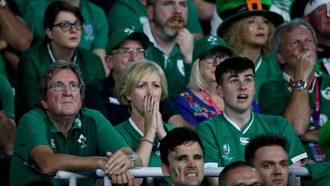Irish fans react as they watch their side slide to a shock defeat to host Japan.