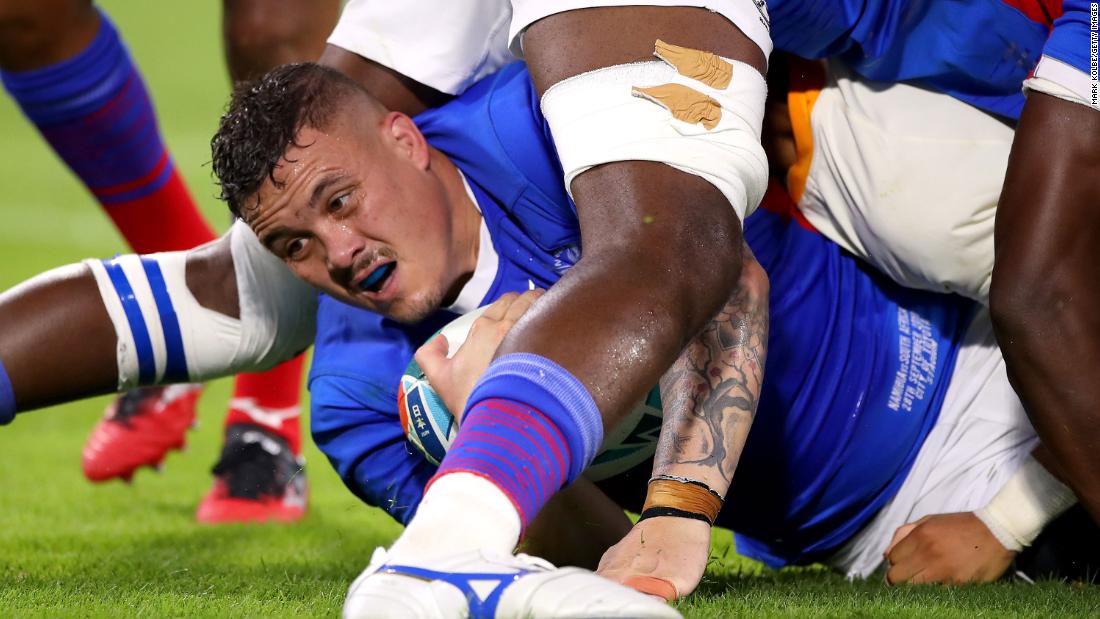 Thomasau Forbes of Namibia looks on from the ground during his side&#39;s nine-try defeat to South Africa.